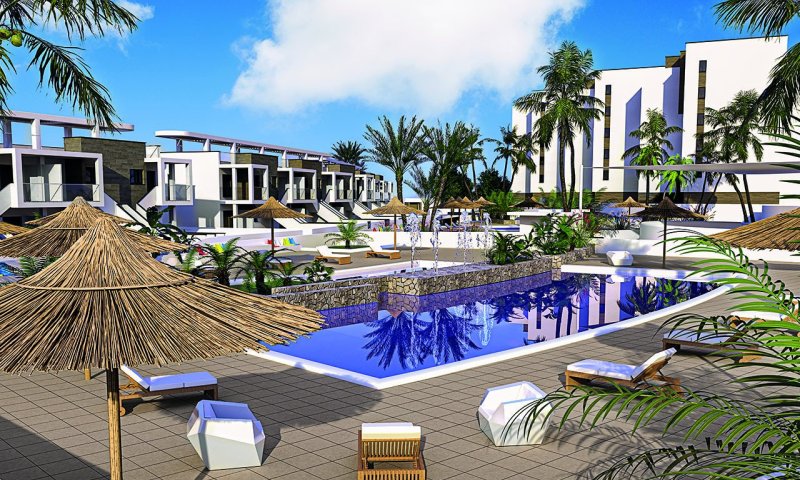 Obergeschoss-Wohnungen mit 2 Schlafzimmern, 2 Bädern und Dachterrasse in abgeschlossener Anlage mit Gemeinschaftspools nur 600 m vom Strand