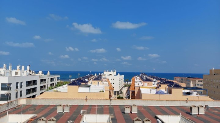 Appartement mit 1 Schlafzimmer, 1 Bad, Tiefgaragenstellplatz, Gemeinschaftspool und tollem Meerblick