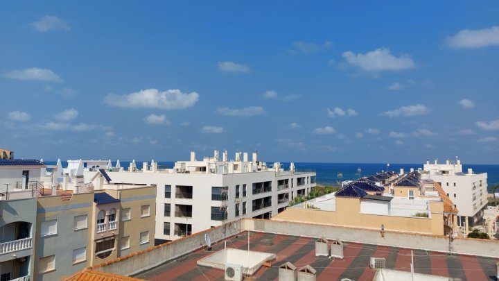 Appartement mit 1 Schlafzimmer, 1 Bad, Tiefgaragenstellplatz, Gemeinschaftspool und tollem Meerblick