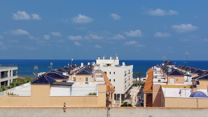 Appartement mit 1 Schlafzimmer, 1 Bad, Tiefgaragenstellplatz, Gemeinschaftspool und tollem Meerblick