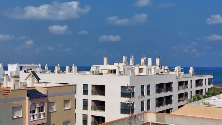 Appartement mit 1 Schlafzimmer, 1 Bad, Tiefgaragenstellplatz, Gemeinschaftspool und tollem Meerblick